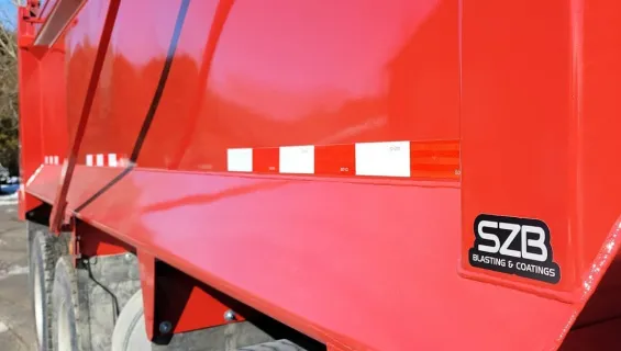 Red truck with SZB logo