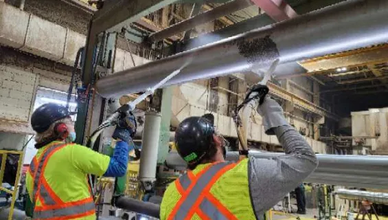 Subzero dry ice blast cleaning a paper mill in Ontario
