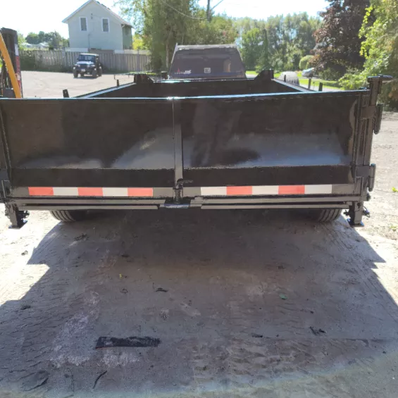 Dump trailer sand-blasting and coating rear