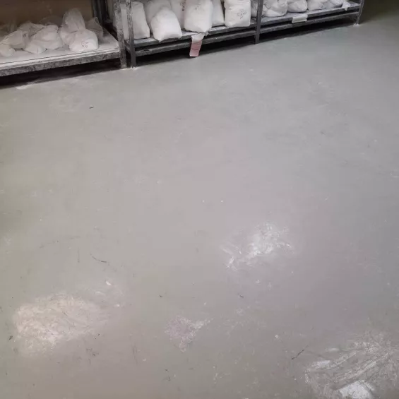 Cleaning industrial manufacturing facility floor