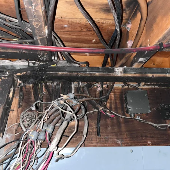 Residential wiring fire damage before