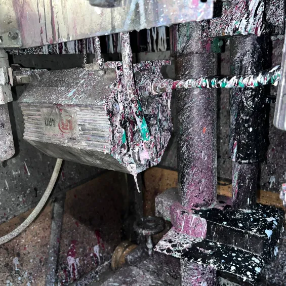 Ink machine with 25 years of ink buildup before dry ice blasting